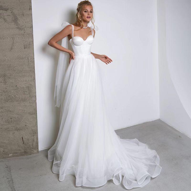 French-style Strapless Wedding Dress With A Bow Featuring A Tulle Train