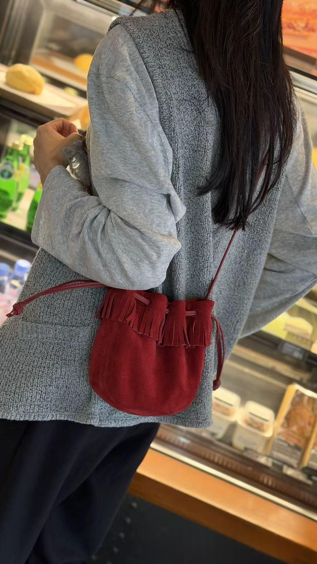 Tassel Bucket Bag, Genuine Leather Single Shoulder Diagonal Cross Bag, 2026 New Drawstring Armpit Bag, High-end Women's Commuting Small Bag - Red photo 1