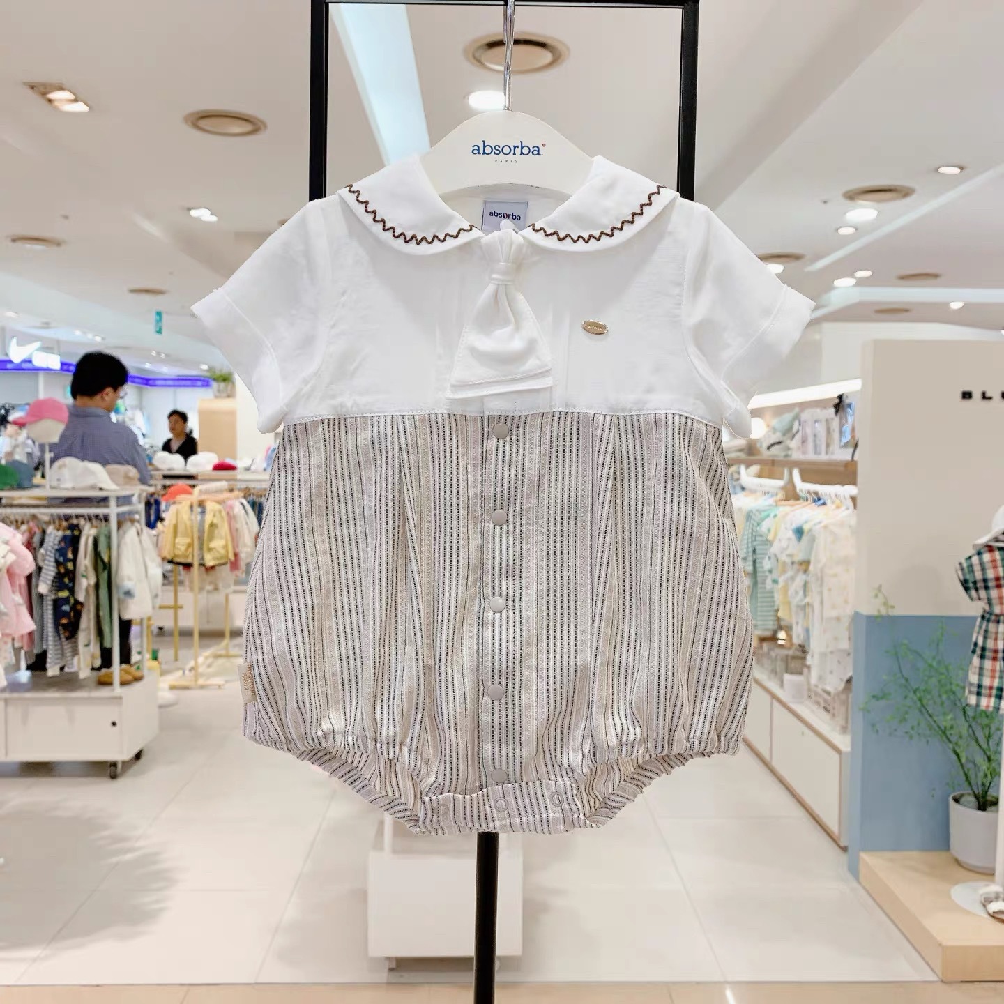 Baby Boy Romper With A Patchwork Navy Collar photo 1