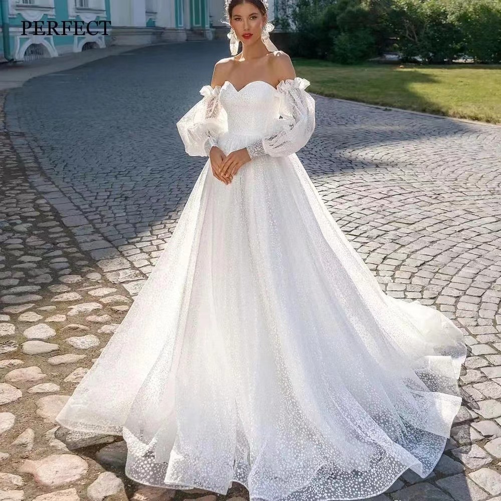 Off-shoulder Lightweight Wedding Dress That Flatters The  With A Trailing Train photo 1