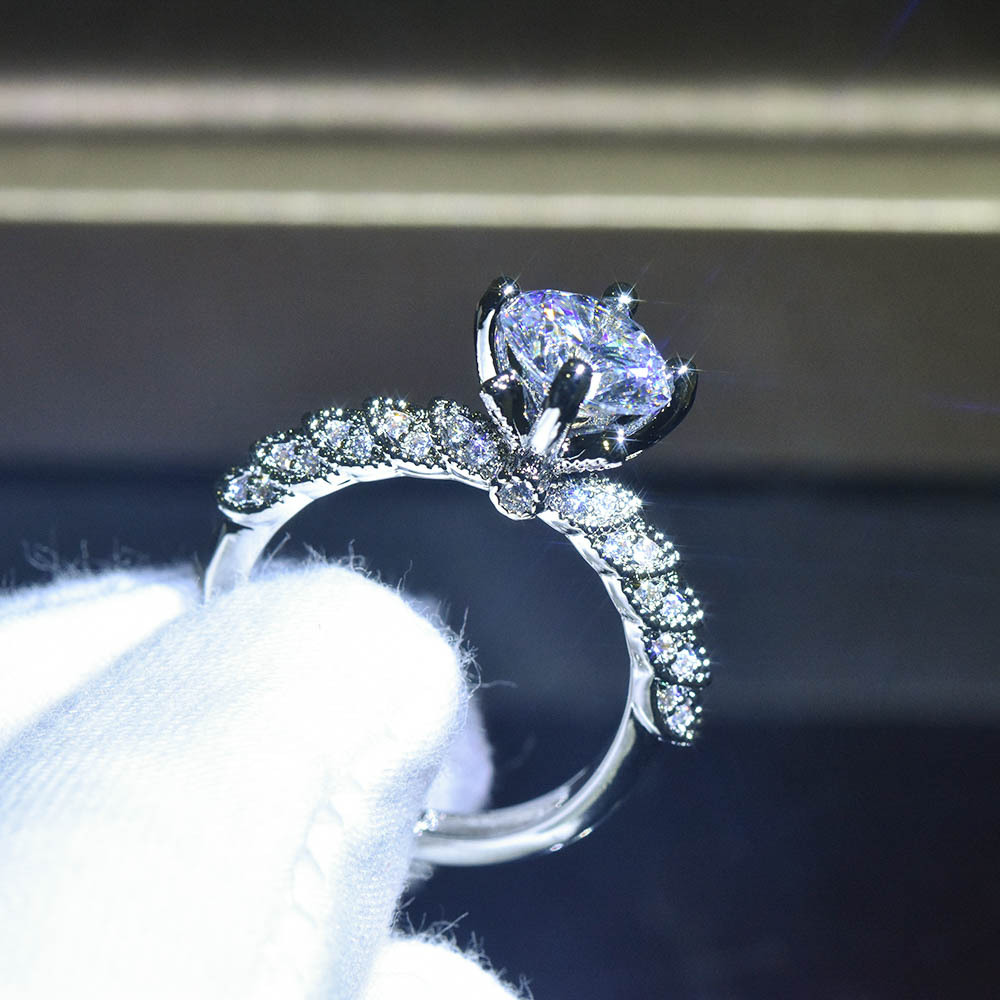 Platinum Plated Moissanite Goddess Of Fortune Ring photo 2