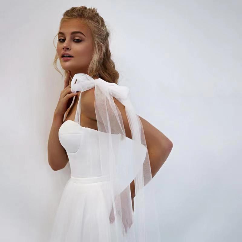 French-style Strapless Wedding Dress With A Bow Featuring A Tulle Train photo 2