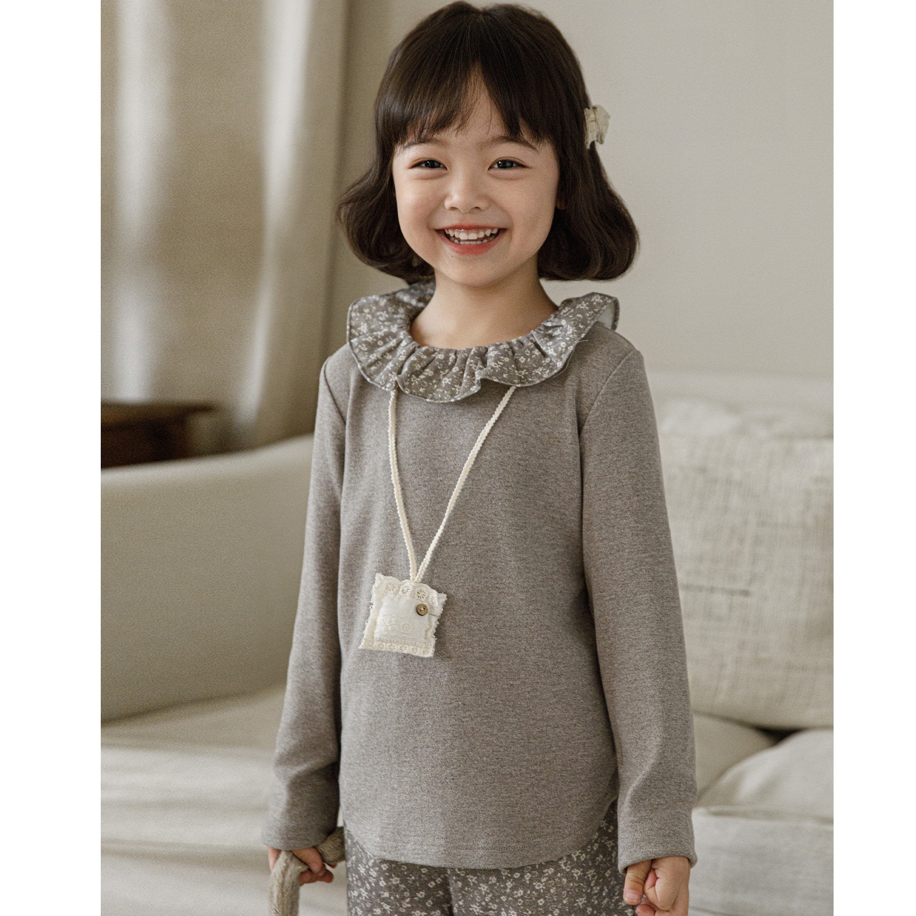 Floral Blouse With A Ruffled Neckline photo 2
