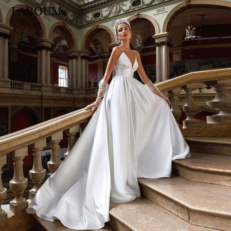 European And American-style Deep V-neck Strap Satin Light Wedding Dress photo 1