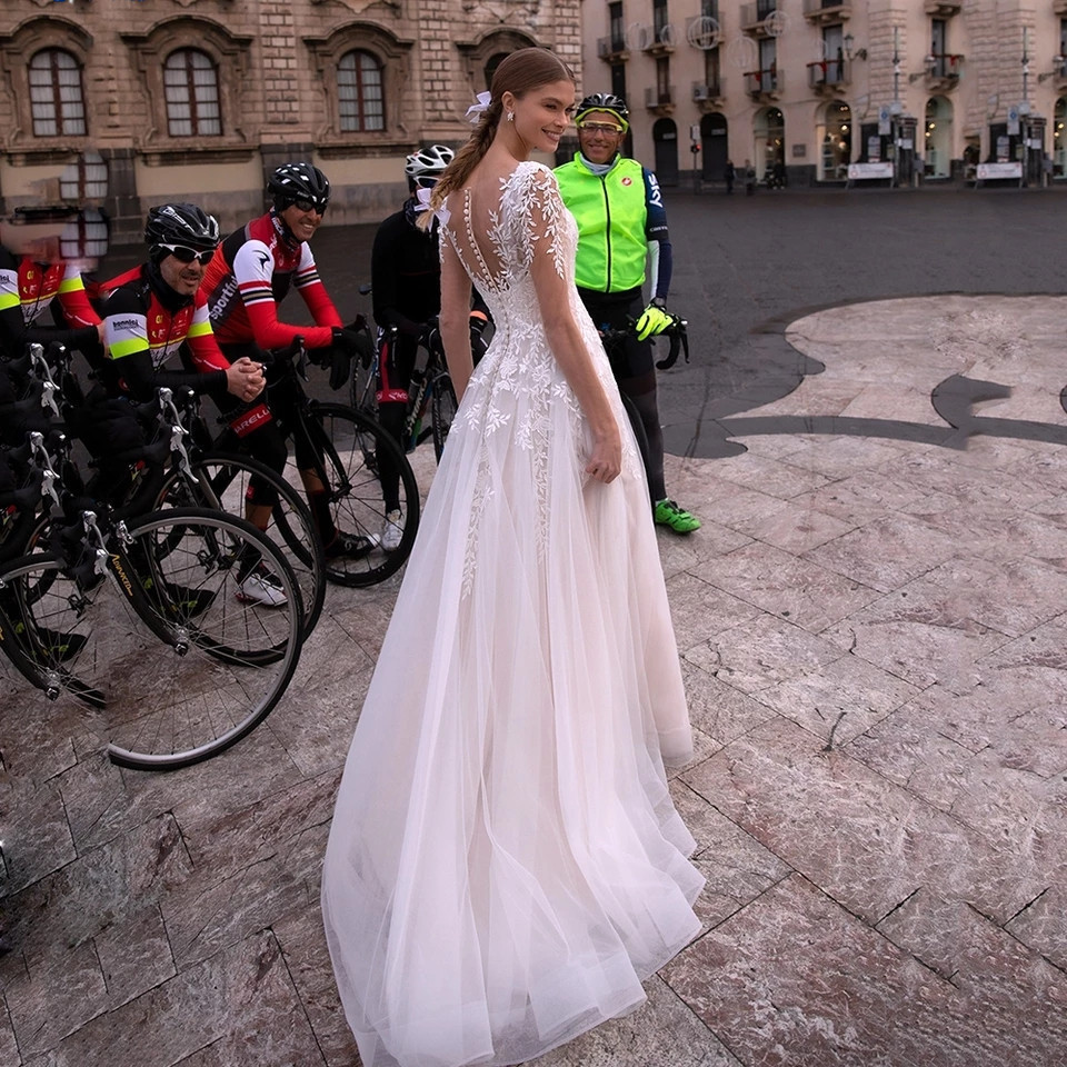 Lace Sheer Tulle A line Wedding Gown With A Short Train, Exuding Elegance For The Bride photo 6