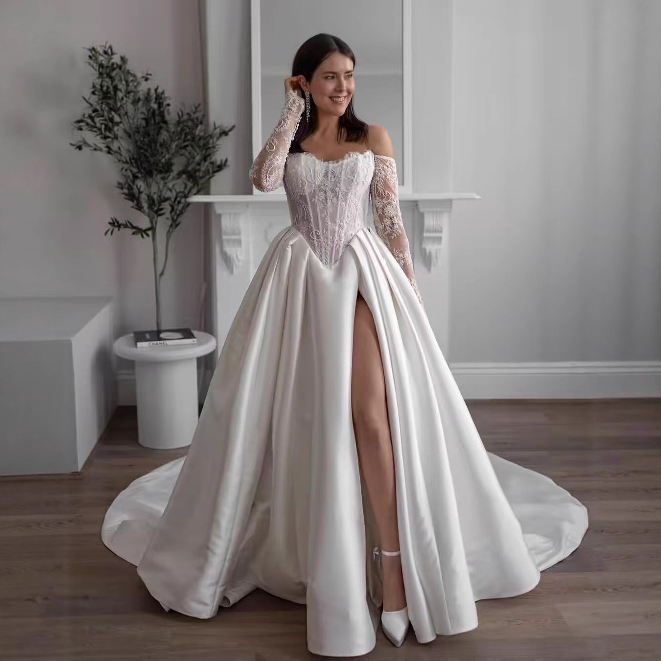 One-shoulder Lace Long-sleeve Wedding Dress photo 1