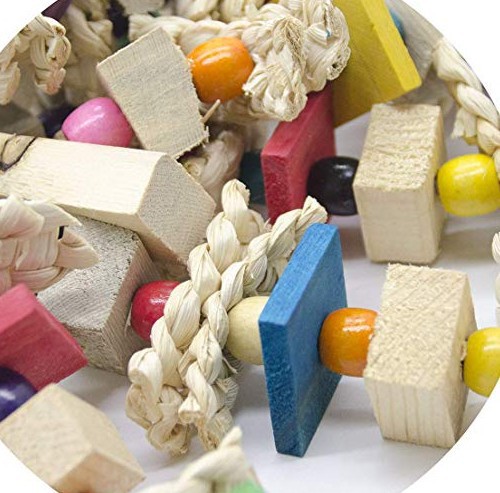 Parrots Gnaw On Toys Made Of Corn Husk And Wood photo 5